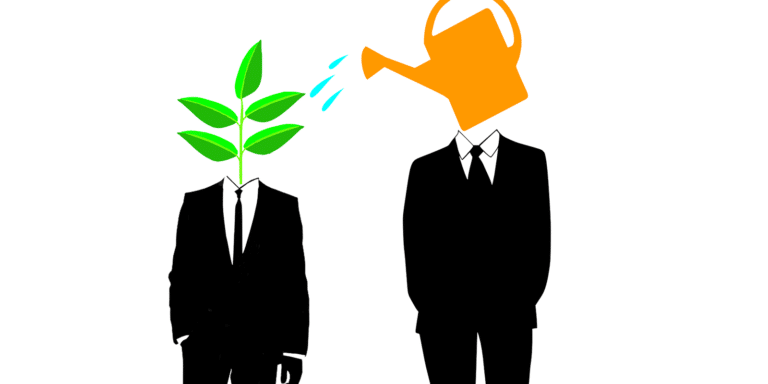 A person in suits watering a plant Description automatically generated