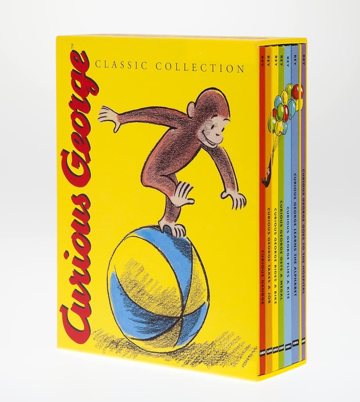 A box of books with a monkey on a ball Description automatically generated