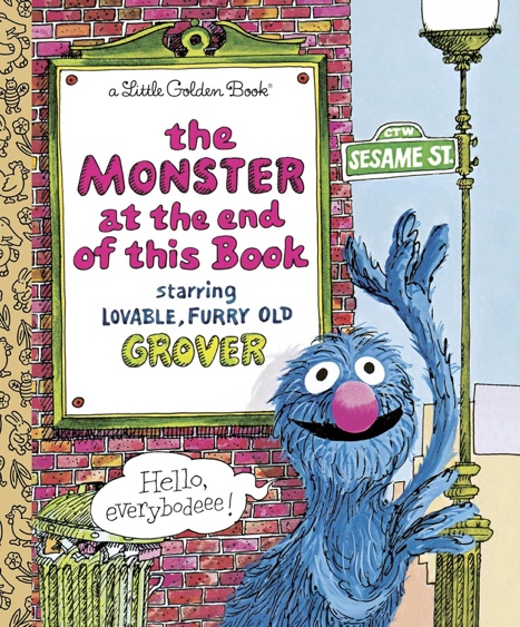 A blue monster next to a sign Description automatically generated